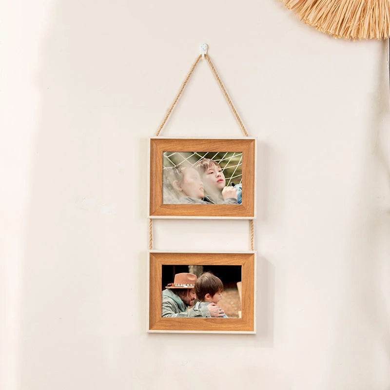 A set of three rustic wooden collage photo frames hanging on a wall, featuring close-up pictures of people.