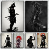 A collection of four black and white canvas prints depicting samurai figures in various poses and styles.