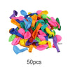 A pile of assorted latex balloons in various bright colors including pink, yellow, green, blue, and purple.