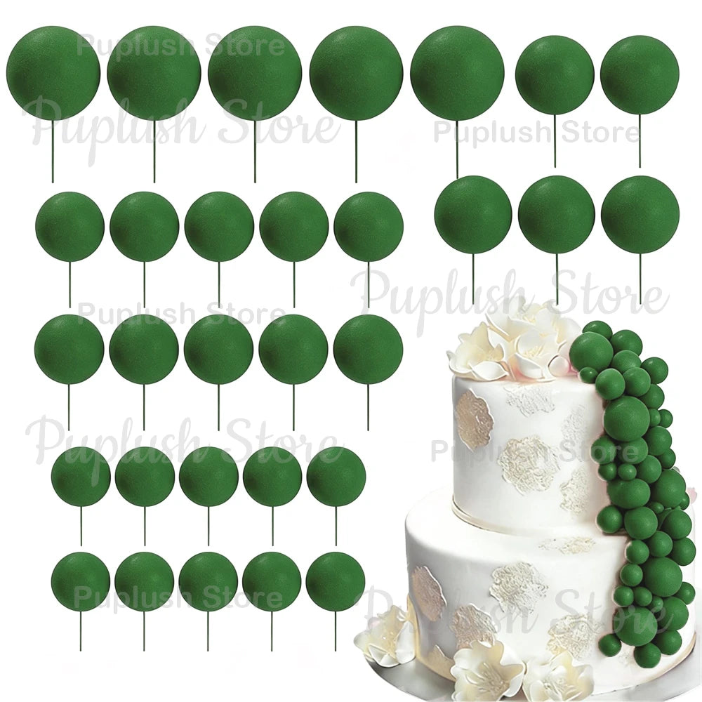 A set of green foam cake toppers on sticks, including various circular shapes.