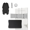 A black portable trifold vanity mirror with an adjustable hook shown next to a garment and a door.