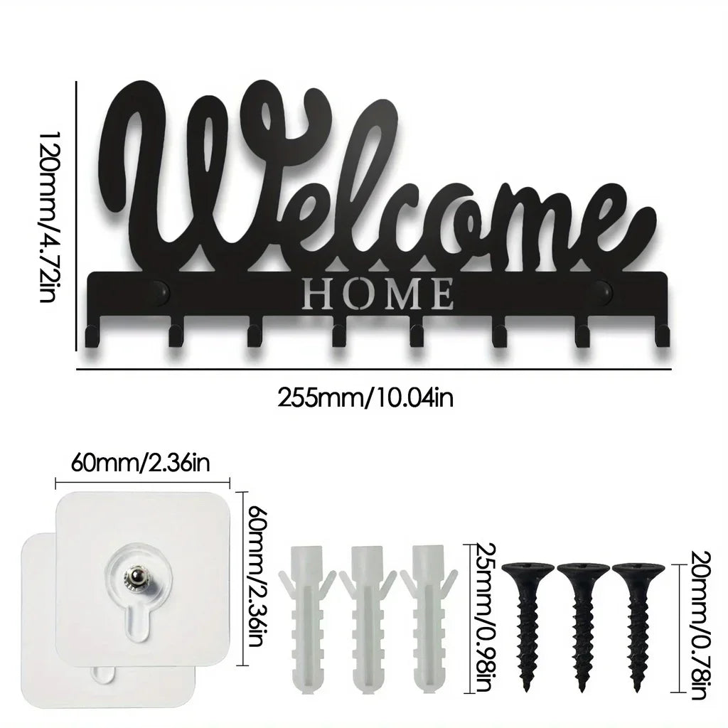 Black decorative metal wall-mounted key holder with seven hooks and a white mounting plate