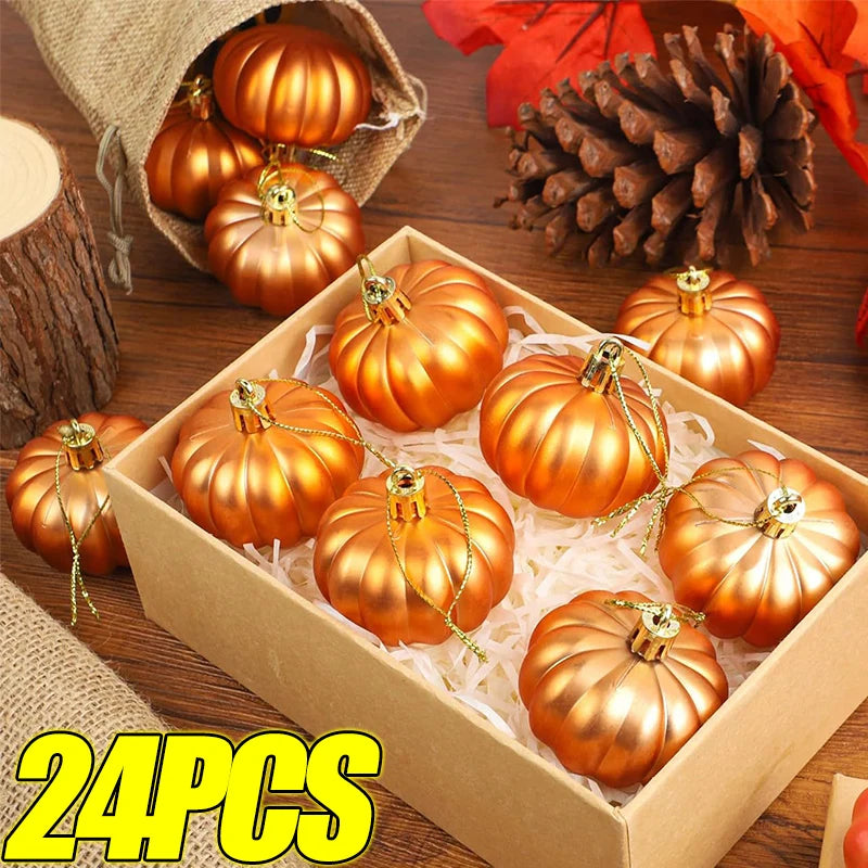 A box filled with 24 golden orange pumpkin hanging ornaments surrounded by pine cones and natural materials.
