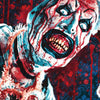 A dramatic, bloody painting of a face with wide eyes and open mouth, rendered in red, blue, and white tones.