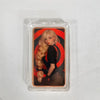 A fine copper fantasy art bar in a protective case featuring a blonde woman's portrait.