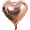 A heart-shaped foil balloon featuring a star design, reflecting an interior room.