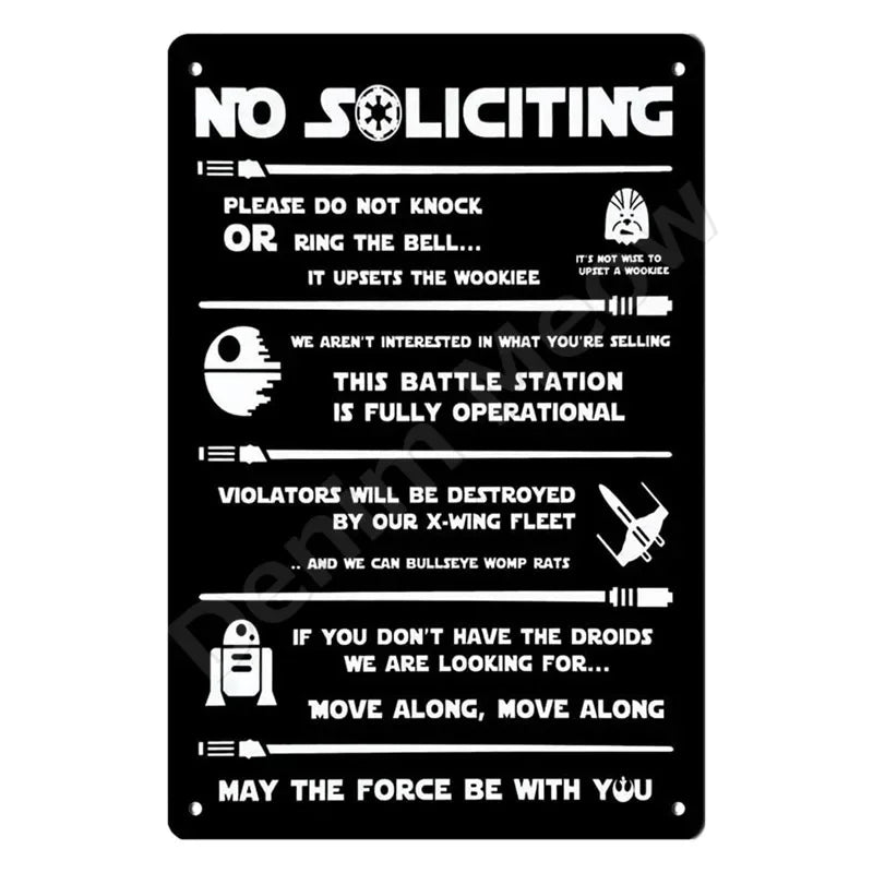 A black metal wall sign with white text that reads NO SOLICITING and other humorous warnings.