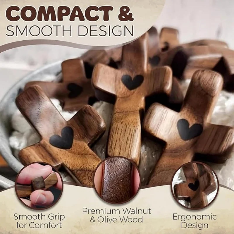 A collection of wooden comfort prayer crosses made from walnut and olive wood with smooth grips.