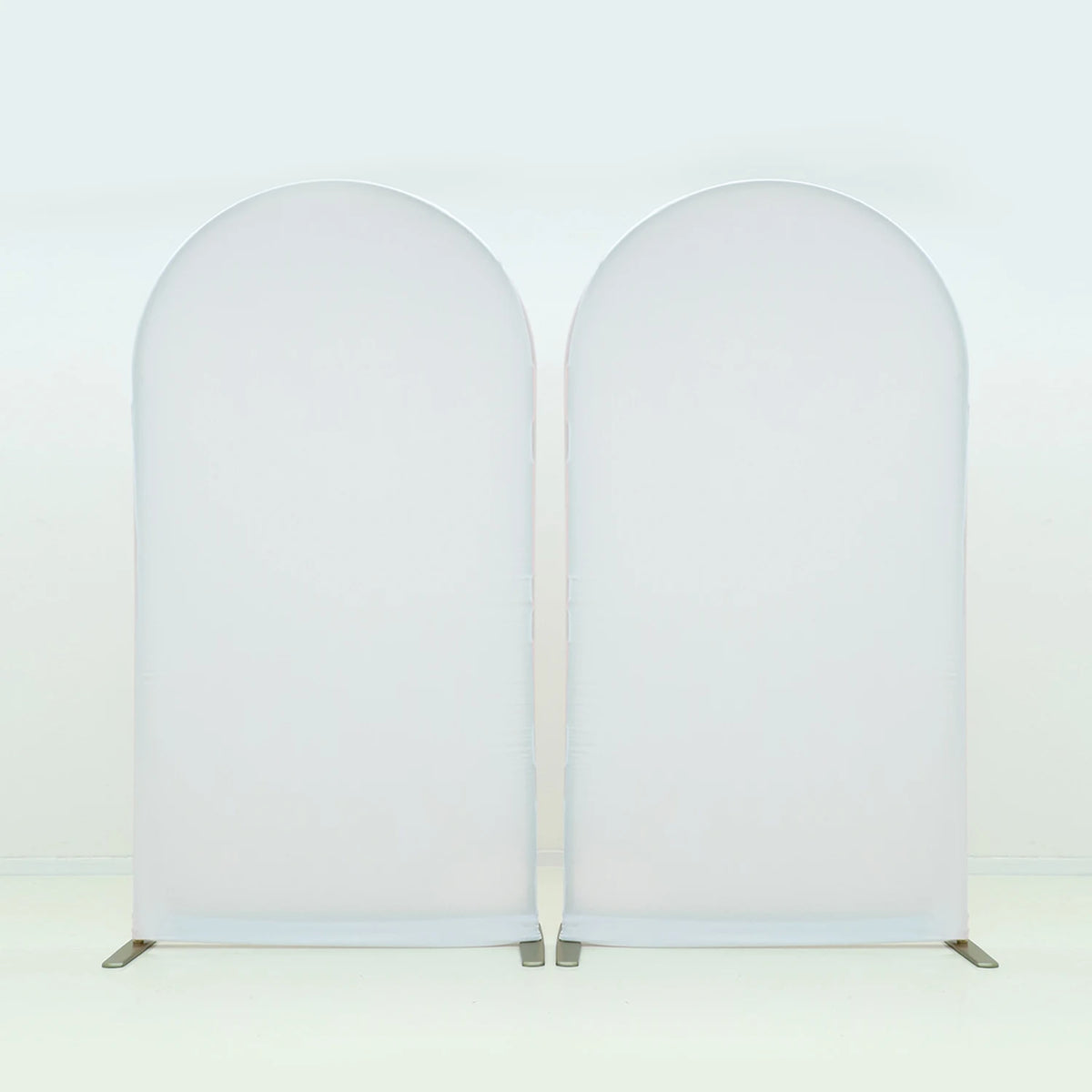 A seamless white stretchable arch backdrop cover for party and event decor.