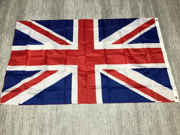 Una bandera nacional del Reino Unido doblada mostrando el diseño Union Jack.