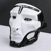 A white and black tactical warden cosplay mask is shown against a gray background.