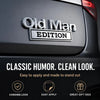 Close-up of an Old Man Edition chrome emblem on a dark car door, highlighting classic humor and a clean look.