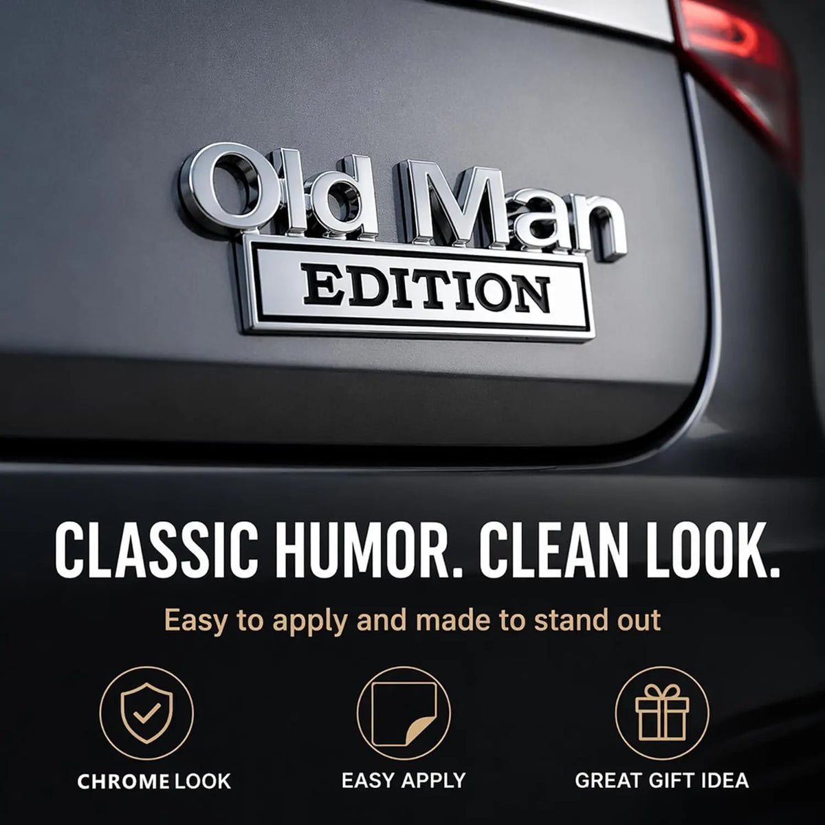 Close-up of an Old Man Edition chrome emblem on a dark car door, highlighting classic humor and a clean look.