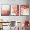 Set of three canvas art prints featuring Islamic calligraphy of Ayatul Kursi in gold and pink tones