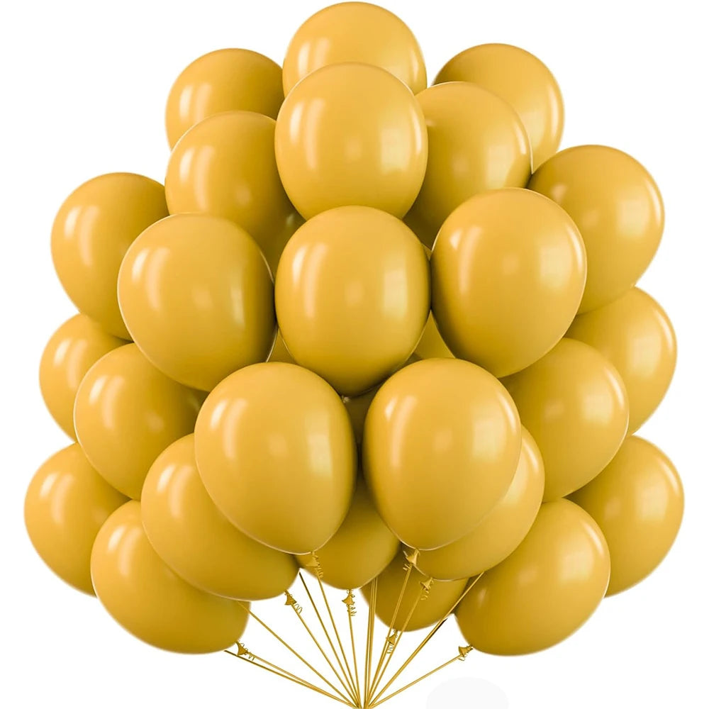 A bunch of golden yellow latex balloons tied together for party decoration.