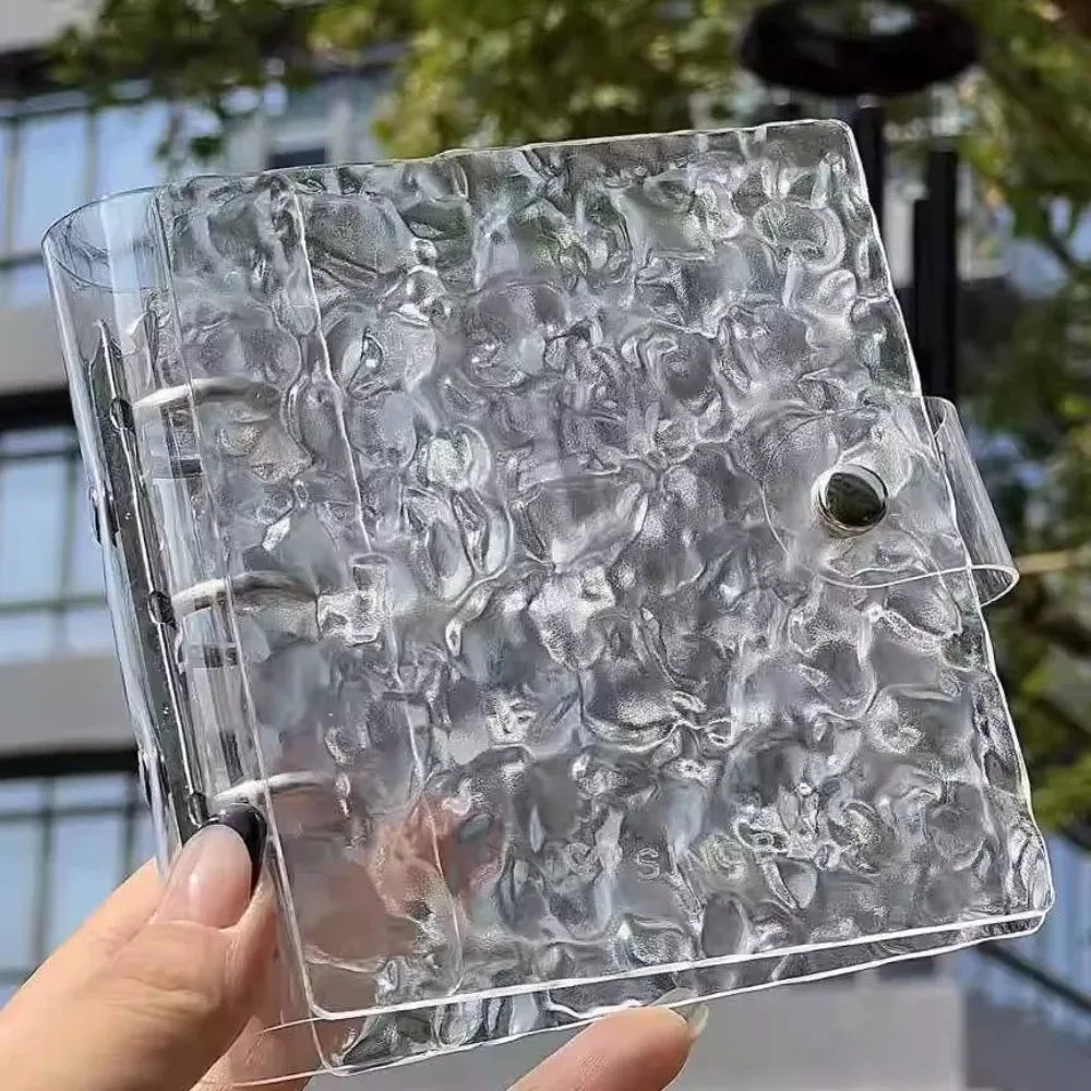 A clear photocard album featuring a textured, translucent design with mushroom-like holes.