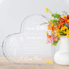 A clear heart-shaped acrylic keepsake with engraved text 'To My Girl' and 'I Love You' surrounded by colorful flowers.