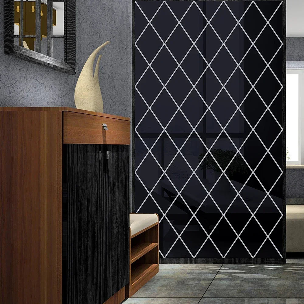 A dark diamond patterned mirror wall sticker displayed next to a wooden cabinet and a beige sculpture.