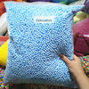 A clear bag filled with light blue foam beads labeled Felicoalice