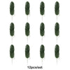 Twelve artificial tropical palm leaves arranged vertically for party decoration