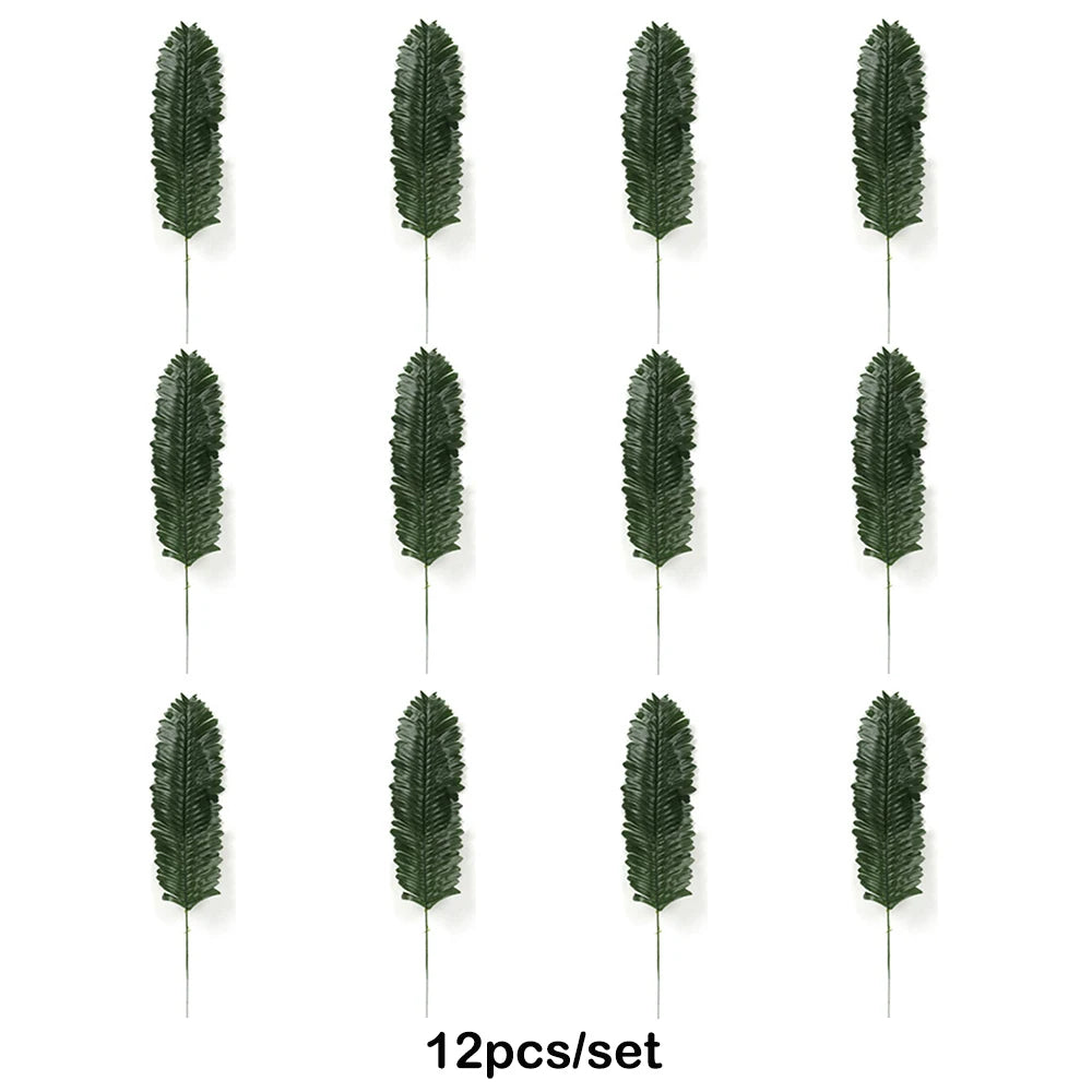 Twelve artificial tropical palm leaves arranged vertically for party decoration