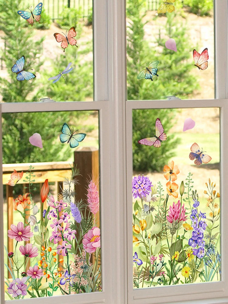 Window decals featuring colorful butterflies and flowers on glass panes.