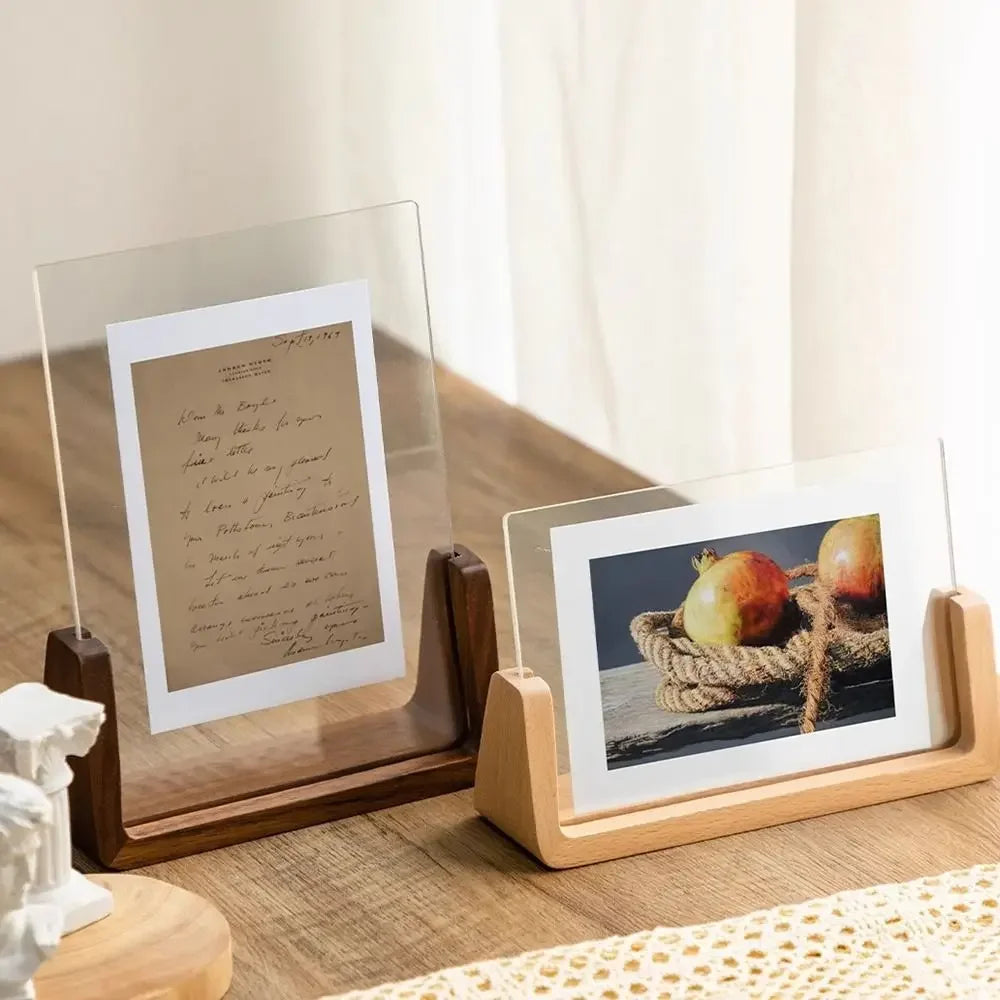 A walnut wood and acrylic photo frame displaying a photograph of apples on a rustic wreath.