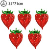 A set of five artificial strawberries used for party decorations