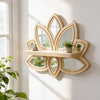 A decorative wooden lotus floating shelf with a mirror and small potted plants mounted on a white wall.
