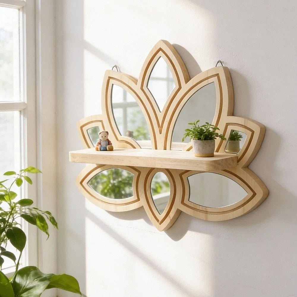 A decorative wooden lotus floating shelf with a mirror and small potted plants mounted on a white wall.