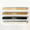 A display of four magnetic wooden art frames in Pine, Teak, Black, and White.