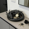 A black dragon-themed desktop storage tray organizer with a circular, textured design and gold accents.