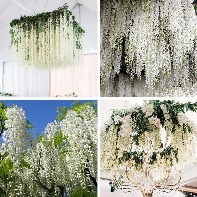 Artificial wisteria vine garland featuring white flowers and green leaves used for floral decor.