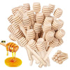 A set of ten natural wood honey dipper sticks and a golden honey dipper shown together.