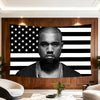 A banner featuring a portrait of Kanye West against an American flag background for decor.