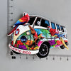 A colorful illustration of a red bird on the front of a vintage van, used as a fridge magnet.