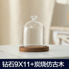 Clear glass aromatherapy candle holder with a dome cover and a wooden base