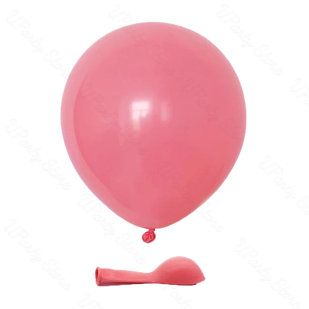 A single, round, pink latex balloon is shown with a pink tool nearby.