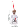 Clear plastic drinking bottle with a red straw and wooden cap