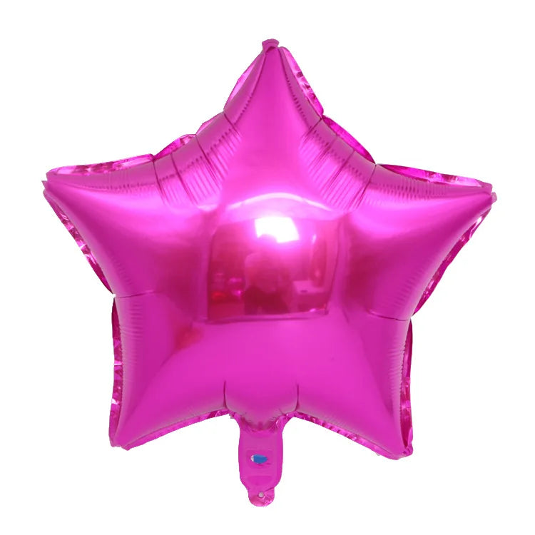 A bright pink foil star and heart balloon assortment.