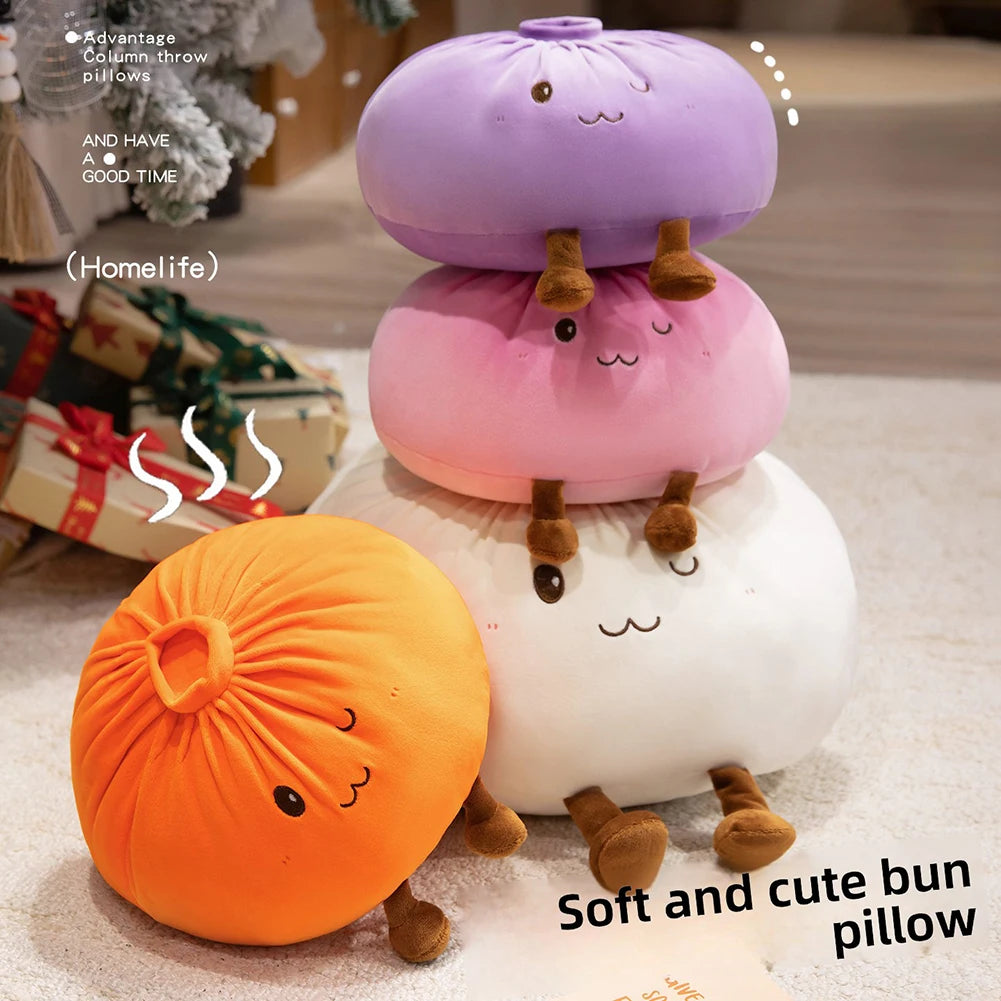A display of three soft and cute decorative stuffed pillows in orange, pink, and white.