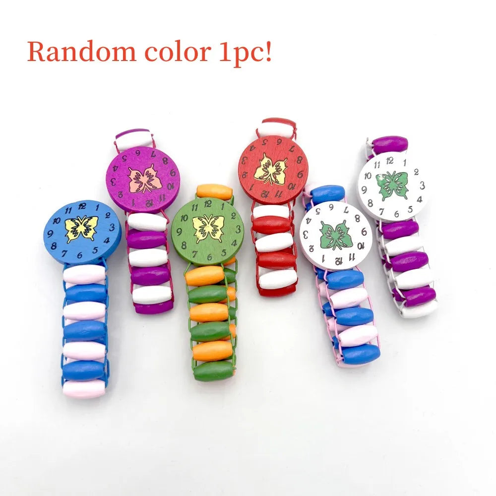 A set of random color beaded jewelry including butterfly hair clips and bracelets.