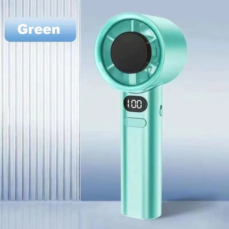 A teal handheld cooling fan with a round grille and digital display is shown against a light blue background.