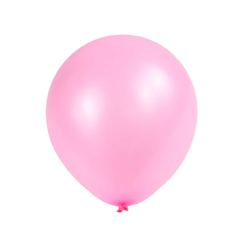 A single, smooth pink latex balloon against a white background.