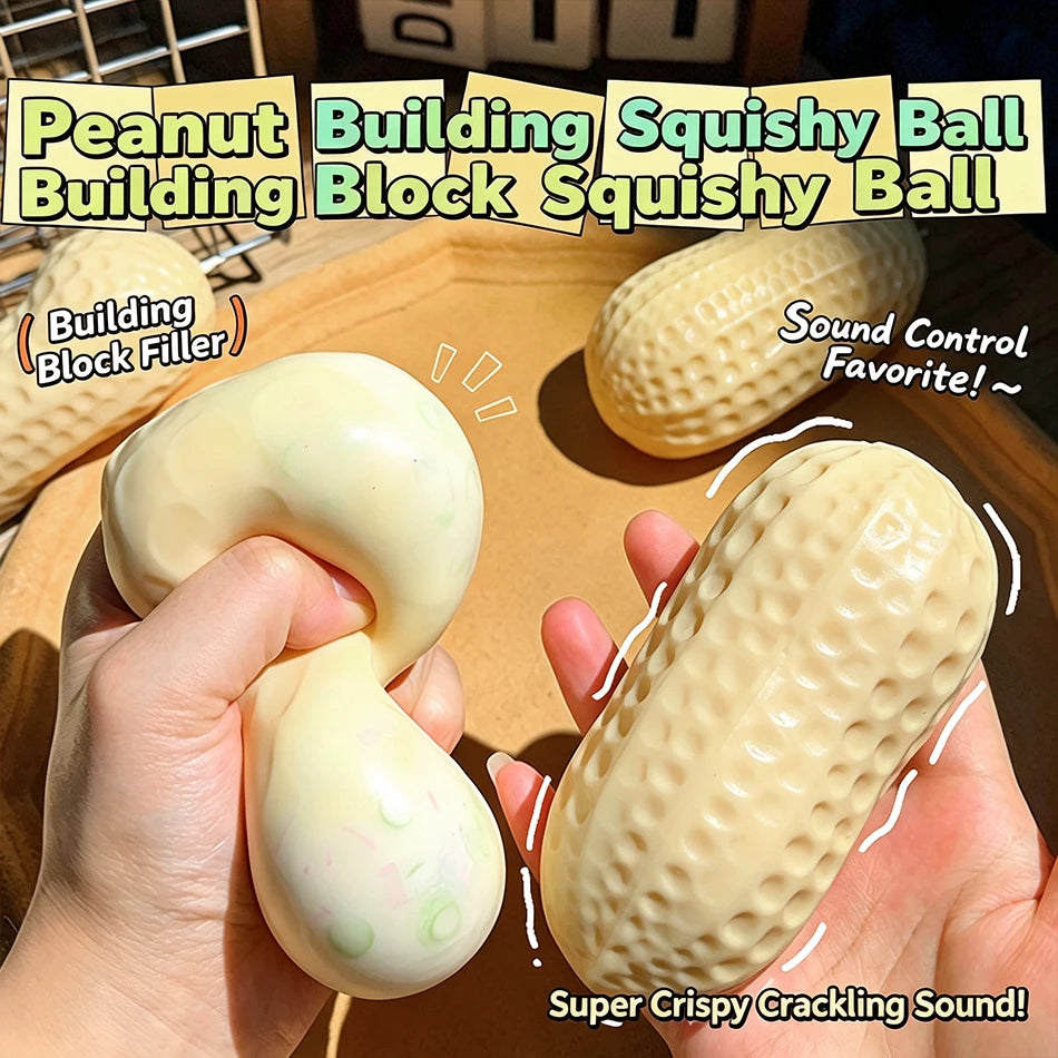 A hand holds a peanut-shaped squishy ball, demonstrating its crispy crackling sound.