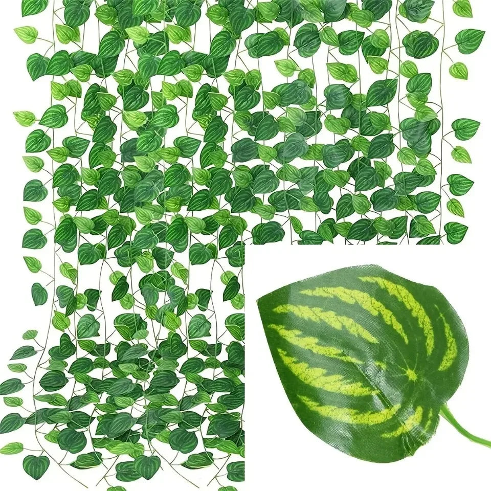 Green artificial ivy vine garland covering a surface and a single leaf