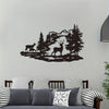 Black silhouette wall art depicting a deer and forest landscape on a white wall.