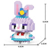 A purple and pink animal model kit built from micro building blocks, featuring a large ear and facial details.