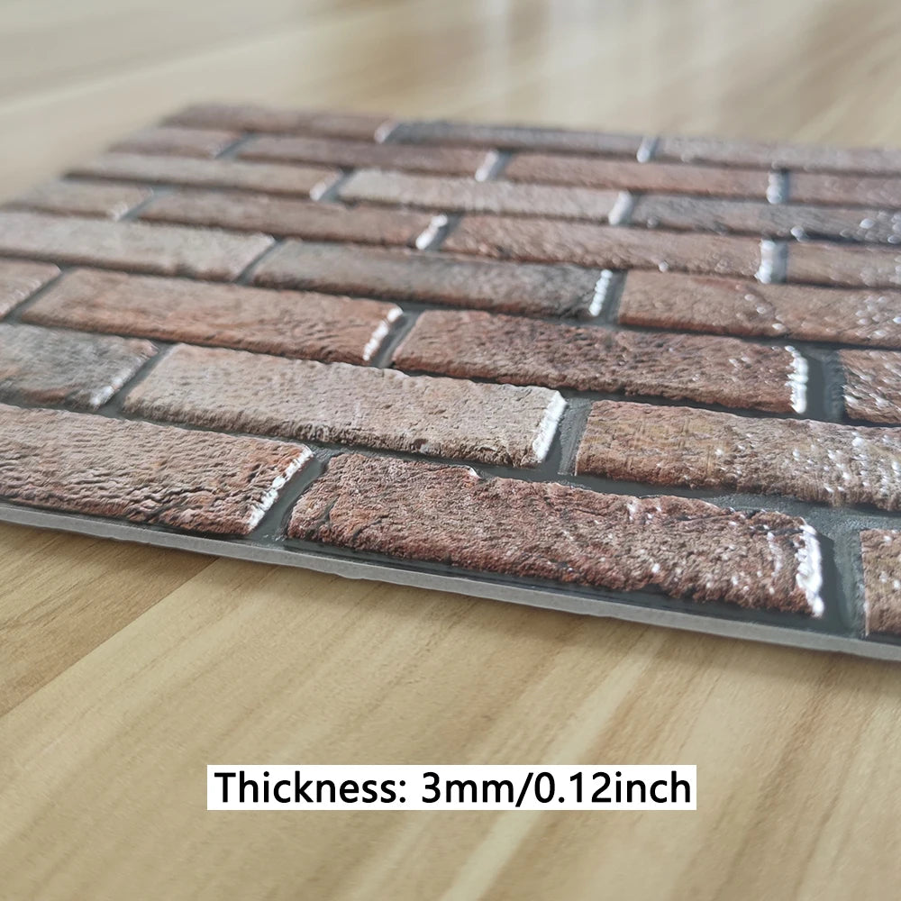 A rectangular pattern of brown and gray 3D brick wall stickers placed on a light wooden surface.