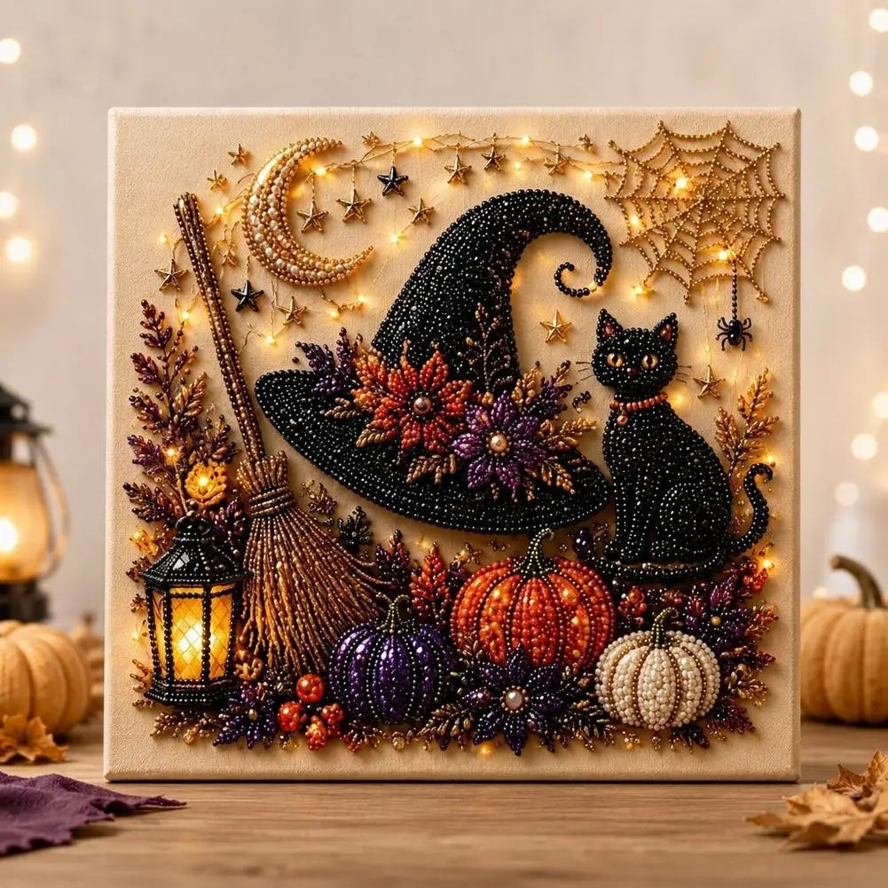 Diamond painting wall decor featuring a black witch silhouette, crescent moon, and autumn foliage with gold glitter accents.